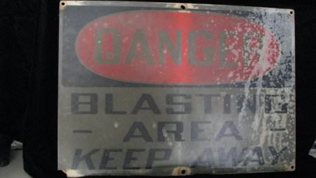 Blasting sign