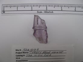 Purple glass bottle neck fragment