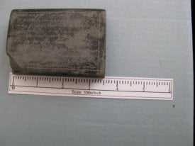 Stone paper weight, side view