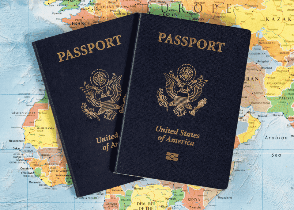 Two passports on top of a map