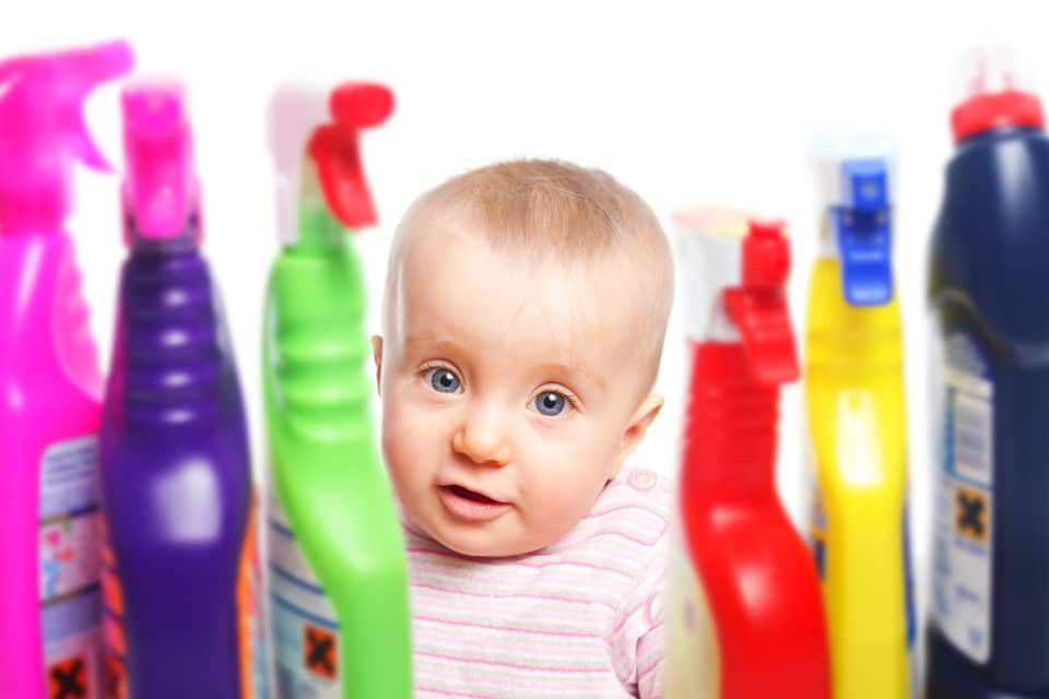 Little child wants to play with chemical cleaner