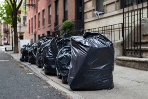 Free Photo  Close up of trash bags filled with trash after cleaning the  environment